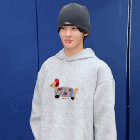 Young Man in Beanie and Dog Hoodie