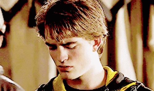 Young Man in Black and Yellow Shirt