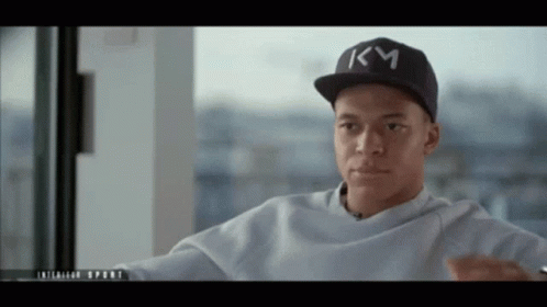 Young Man In Black Hat With KM GIF