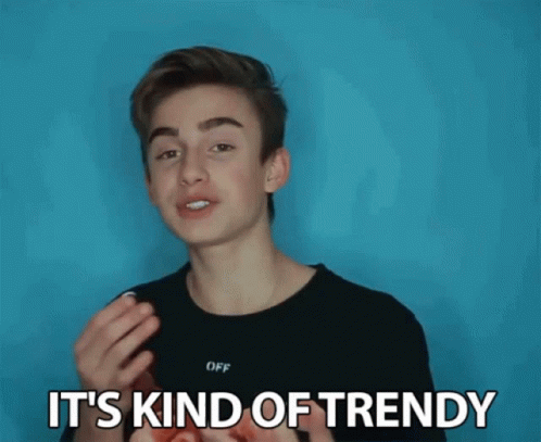Young Man in Black Shirt Saying It's Kind of Trendy