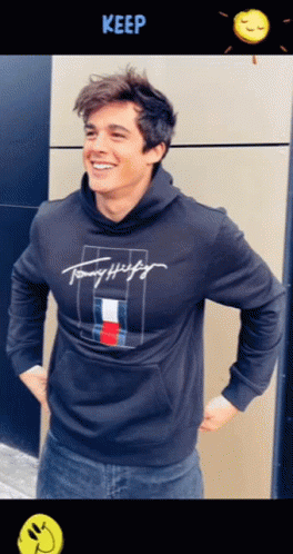 Young Man in Black Tommy Hilfiger Hoodie