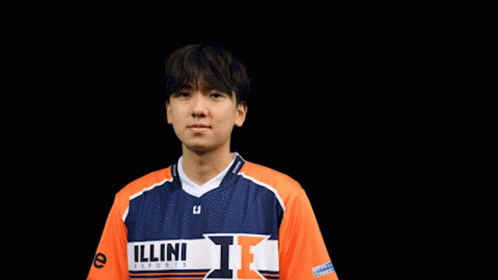 Young Man in Blue and Orange Jersey With Letter L