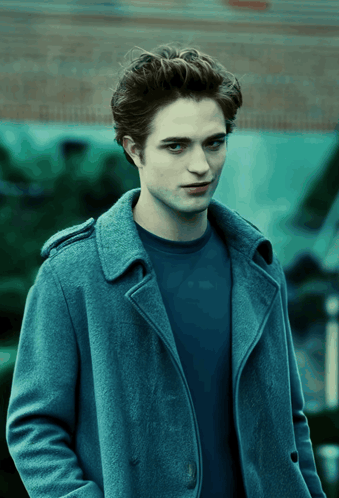 Young Man In Blue Coat And Shirt GIF