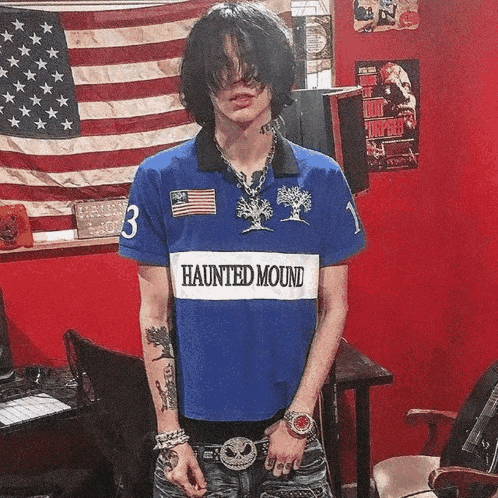 Young Man In Blue Haunted Mound Shirt GIF