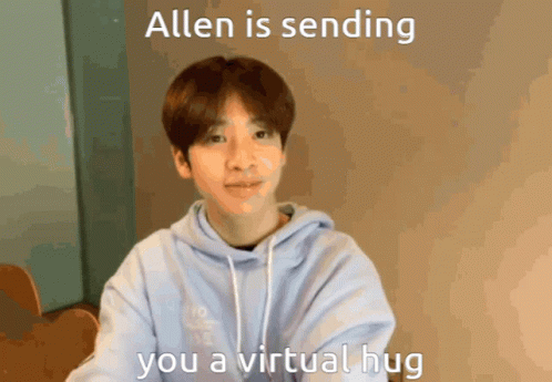 Young Man In Blue Hoodie Sending Virtual Hug GIF