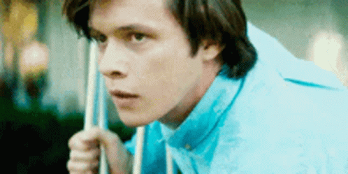 Young Man In Blue Shirt Holding Pool Cue GIF