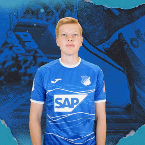 Young Man in Blue Shirt Saying Sap