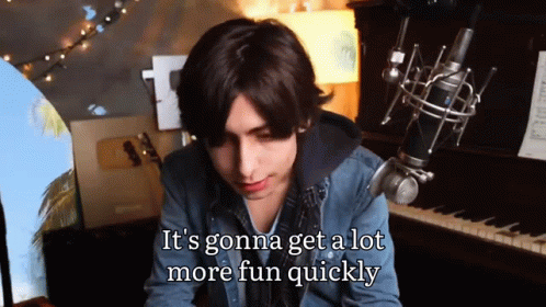 Young Man In Denim Jacket Singing GIF