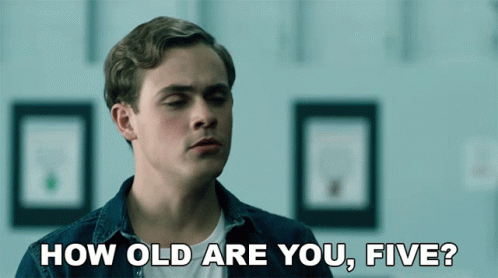 Young Man in Denim Shirt Saying How Old Are You Five