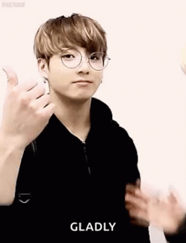 Young Man in Glasses and Black Hoodie Thumbs Up