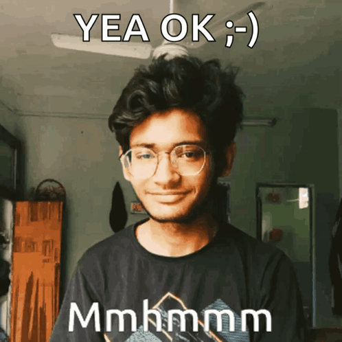 Young Man in Glasses and Black Shirt Saying Yea Ok