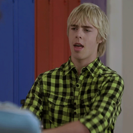 Young Man in Green and Black Plaid Shirt Talking