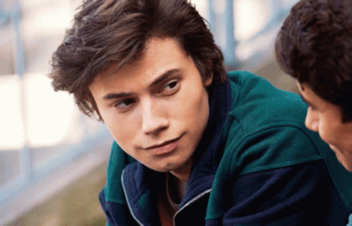 Young Man in Green Jacket Close Up