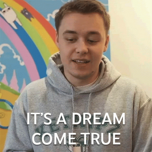 Young Man In Grey Hoodie Says It's A Dream Come True GIF