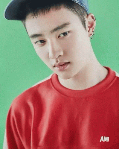 Young Man in Hat and Red Ami Shirt