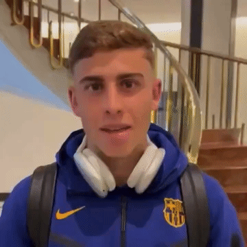 Young Man In Headphones And FC Barcelona Jacket GIF