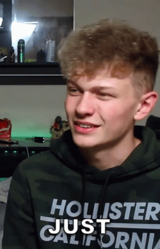 Young Man In Hollister California Sweatshirt GIF