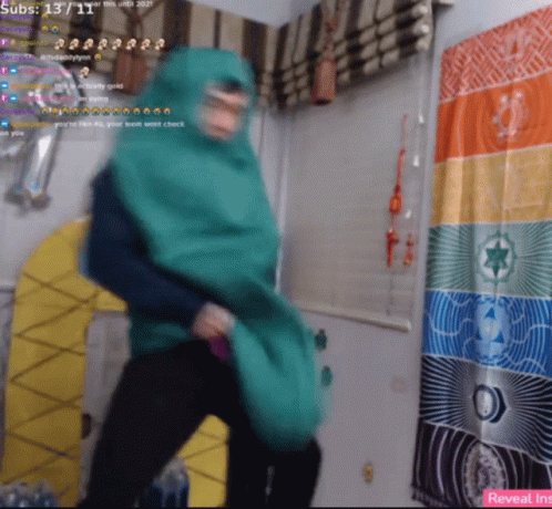 Young Man In Miami Heat Sweatshirt Covering Nose GIF