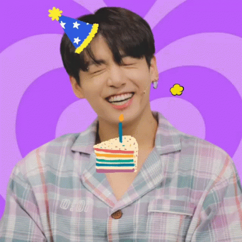 Young Man In Party Hat Holding Cake In Mouth Saying Happy Birthday GIF