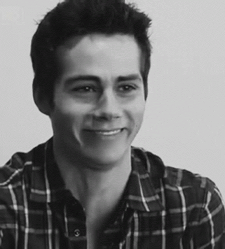 Young Man in Plaid Shirt Black and White