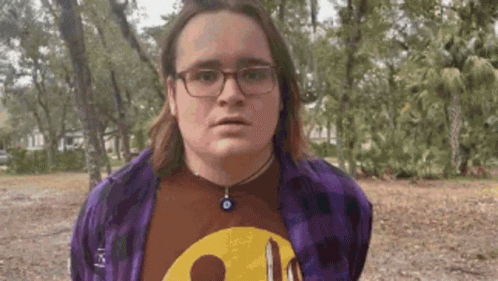 Young Man in Purple Plaid Shirt