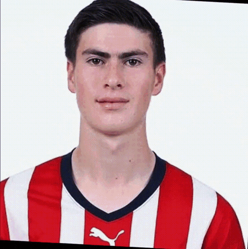 Young Man In Red And White Soccer Jersey GIF