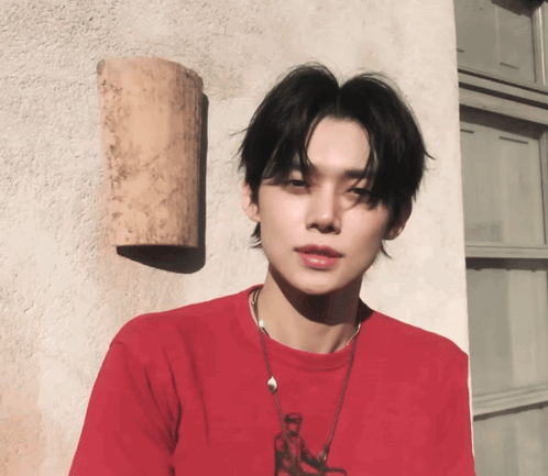 Young Man in Red Shirt