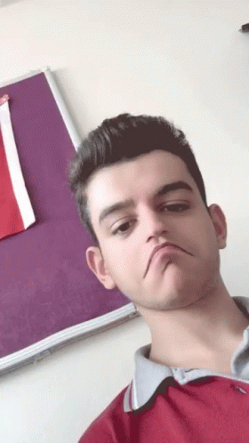 Young Man In Red Shirt Funny Face Purple Board GIF