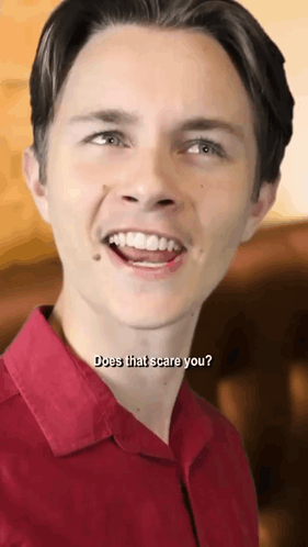 Young Man In Red Shirt Saying Does That Scare You GIF