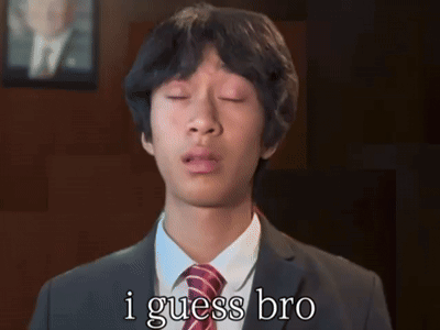Young Man in Suit and Tie Saying I Guess Bro