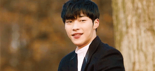 Young Man in Suit and Tie Smiling