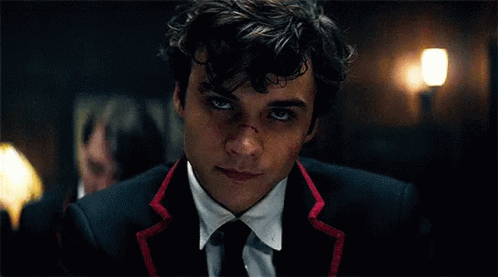 Young Man in Suit and Tie With Bloody Nose