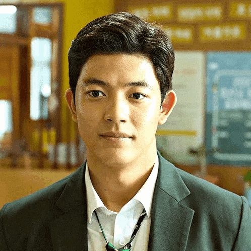 Young Man in Suit Tie Looking at Camera
