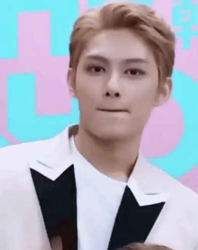 Young Man in Tuxedo Making Funny Face