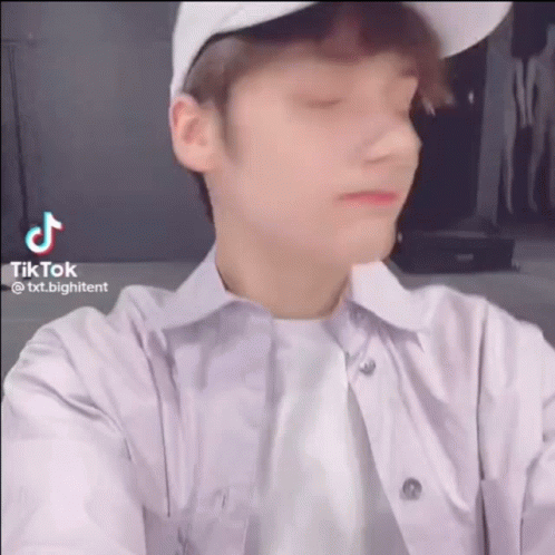 Young Man in White Hat Making Funny Face