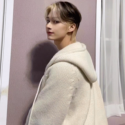Young Man in White Hooded Sweater