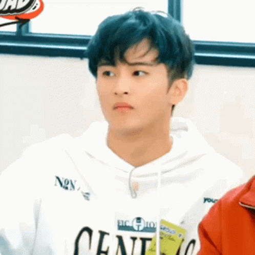 Young Man in White Hoodie Saying Cent