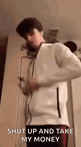 Young Man In White Jacket At Door GIF