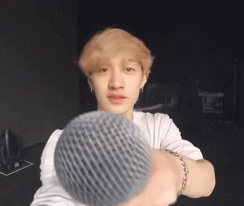 Young Man In White Shirt Grey Beanie Taking Selfie GIF