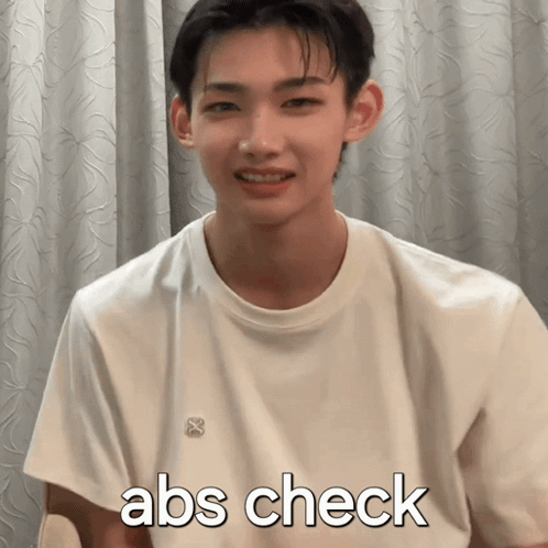 Young Man In White Shirt Saying Abs Check GIF