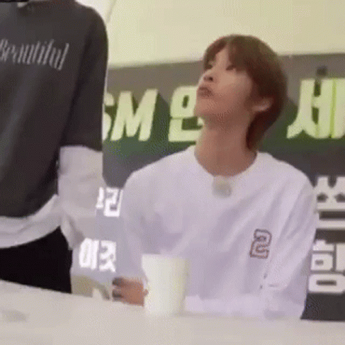 Young Man In White Shirt With Coffee GIF
