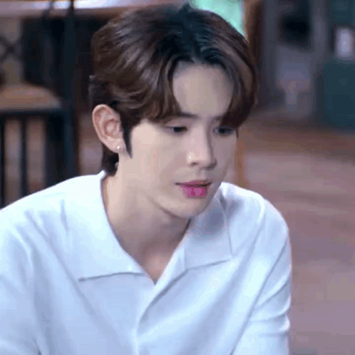Young Man in White Shirt With Pink Lipstick