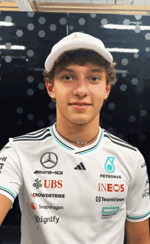 Young Man in White Shirt with UBS and INEOS