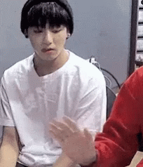 Young Man In White T-Shirt And Black Headband GIF