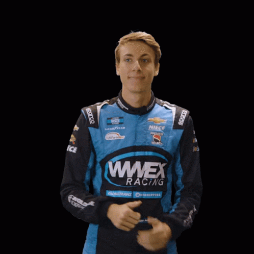 Young Man In Wmex Racing Jacket Giving Thumbs Up GIF