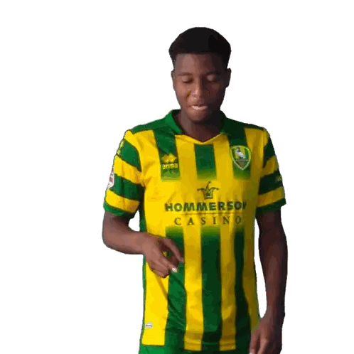 Young Man in Yellow and Green Striped Shirt Saying Casino