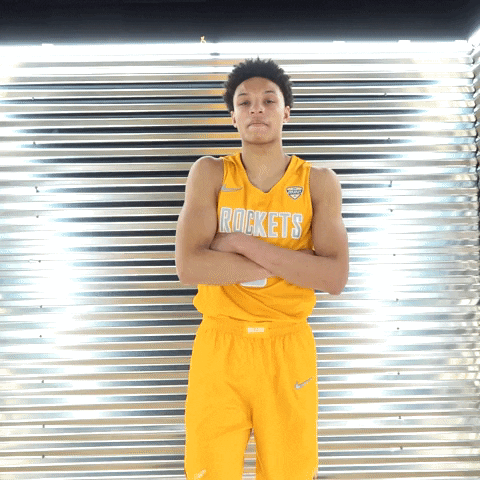 Young Man in Yellow Rockets Jersey Arms Crossed