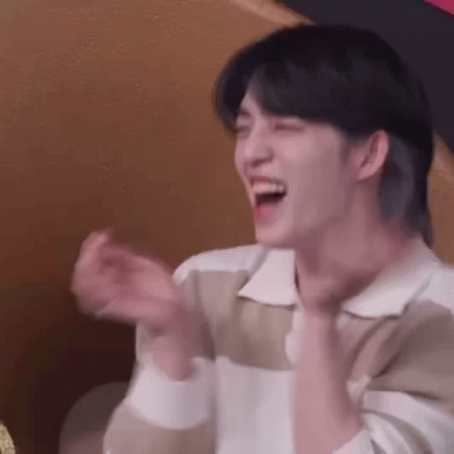 Young Man Laughing And Clapping Hands GIF