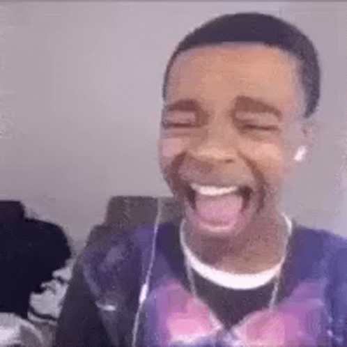 Young Man Laughing and Tongue Out with Headphones