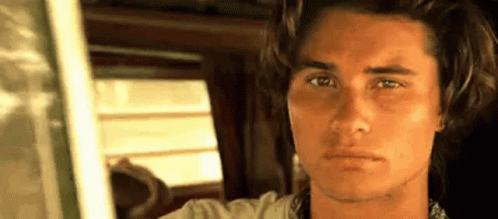 Young Man Looking At Camera GIF